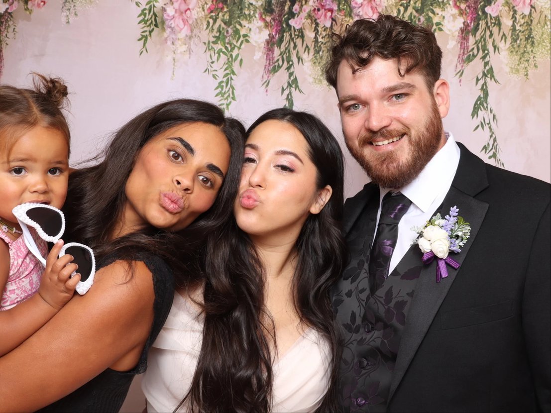 Guests enjoying the photo booth at a Utah event